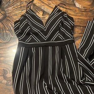 Striped black & white pantsuit. Stretch material.